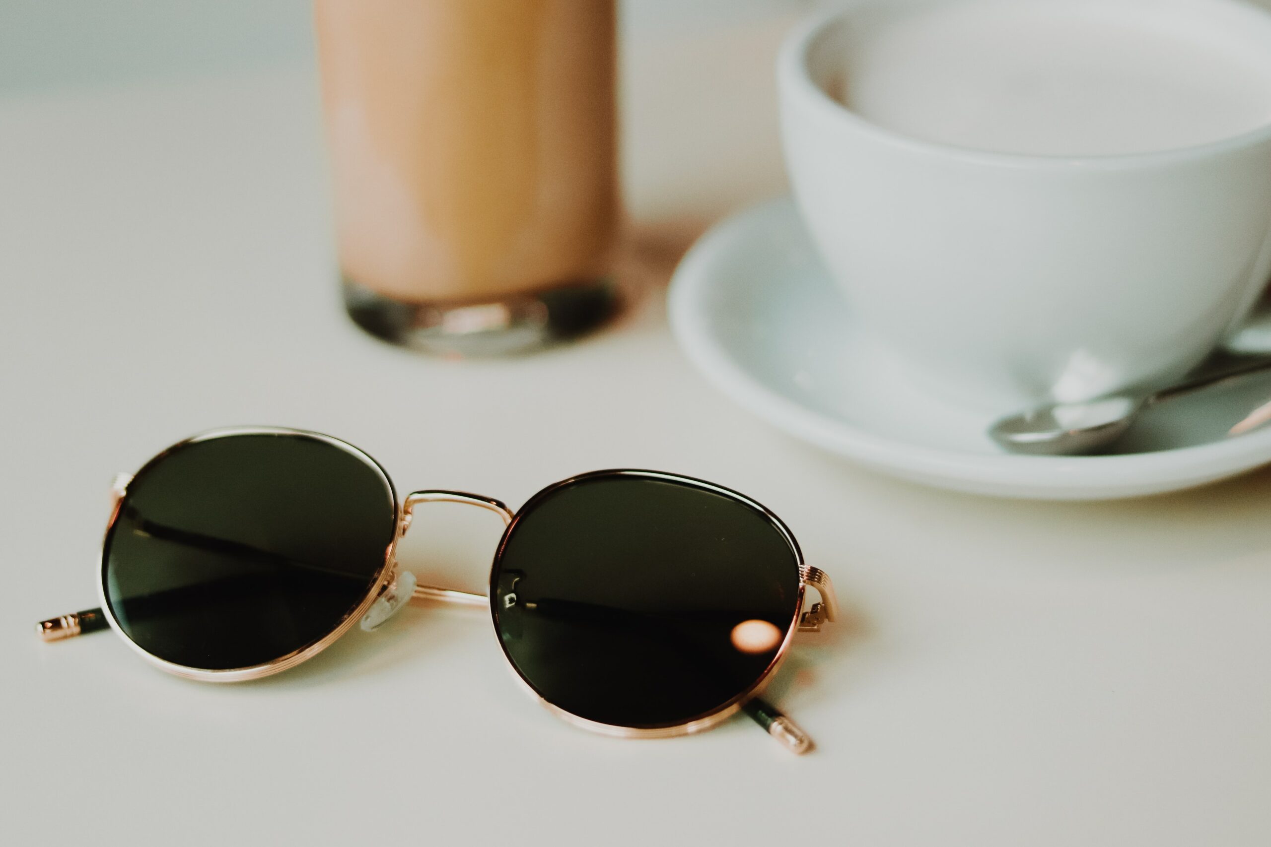 Sunglasses and coffee cup